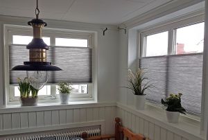 Duettegardiner stoppar värmen affaktivt på insidan fönstret